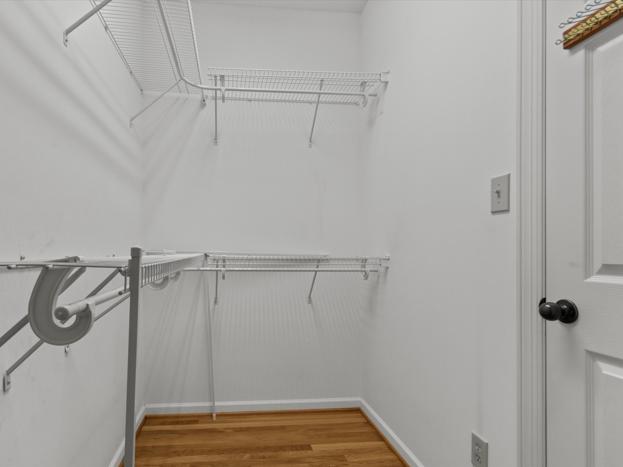 715 South Clinton Street Athens, AL 35611 - Photo 16 of 63 a view of a room with racks on the wall