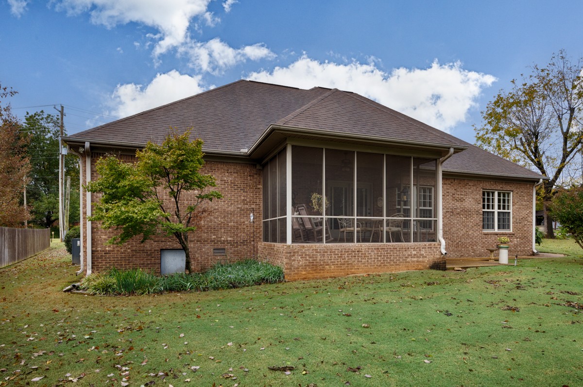 715 South Clinton Street Athens, AL 35611 - Photo 32 of 63 a front view of a house with garden