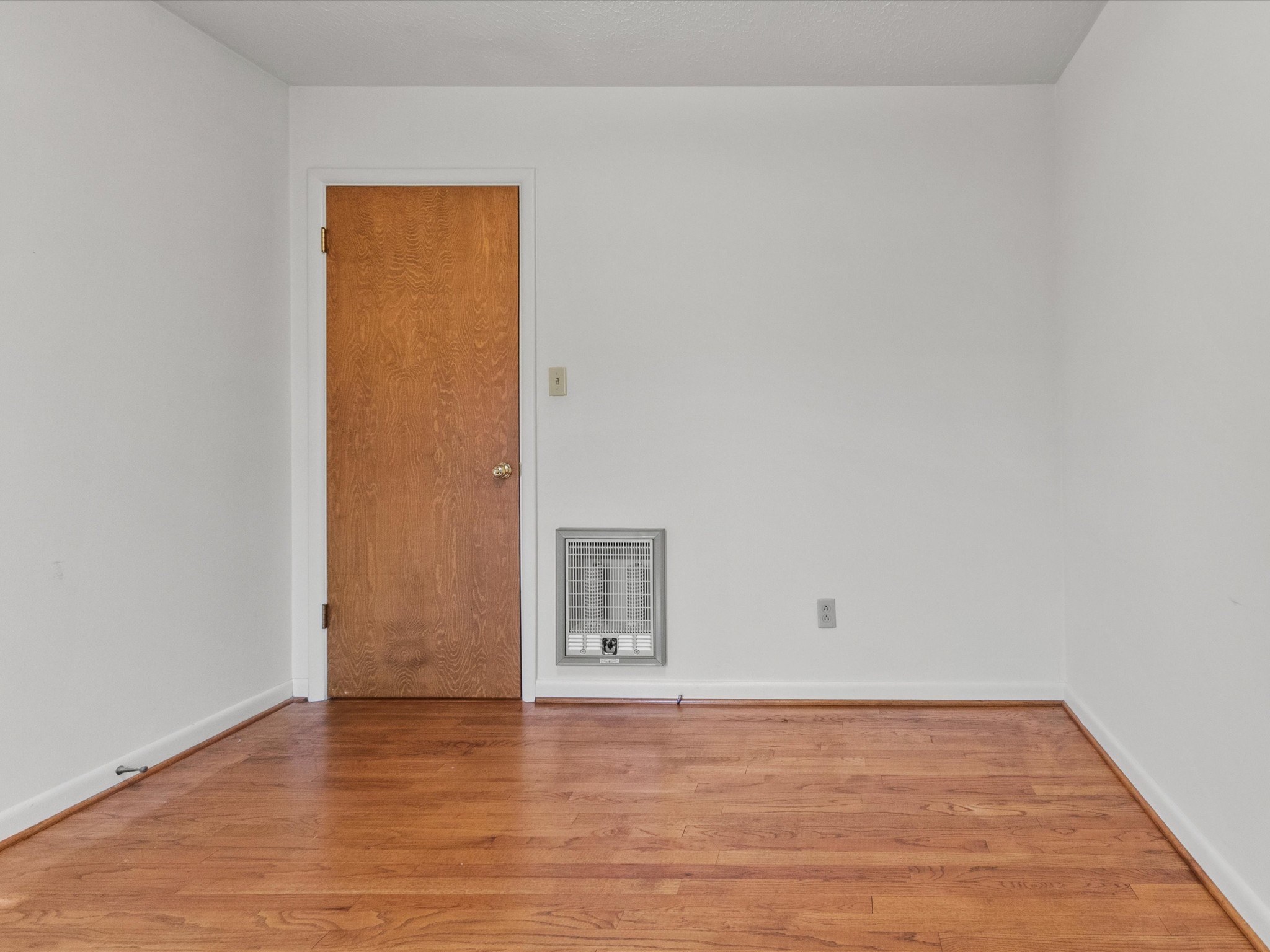 715 South Clinton Street Athens, AL 35611 - Photo 47 of 63 a view of an empty room and wooden floor