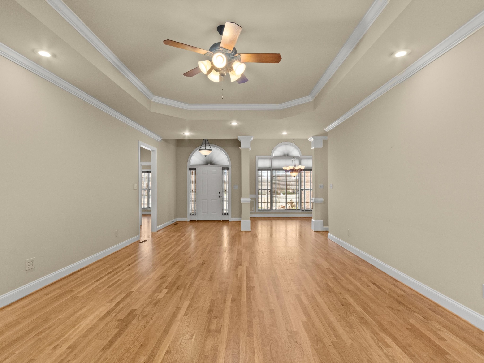 715 South Clinton Street Athens, AL 35611 - Photo 6 of 63 wooden floor in an empty room with a window