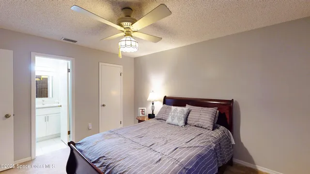 a bathroom with a shower and a toilet