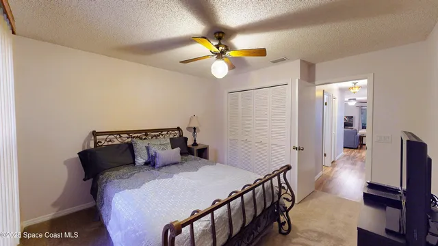 a bathroom with a shower and a toilet