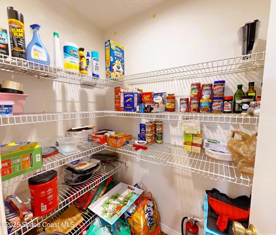 a view of a swimming pool with a yard