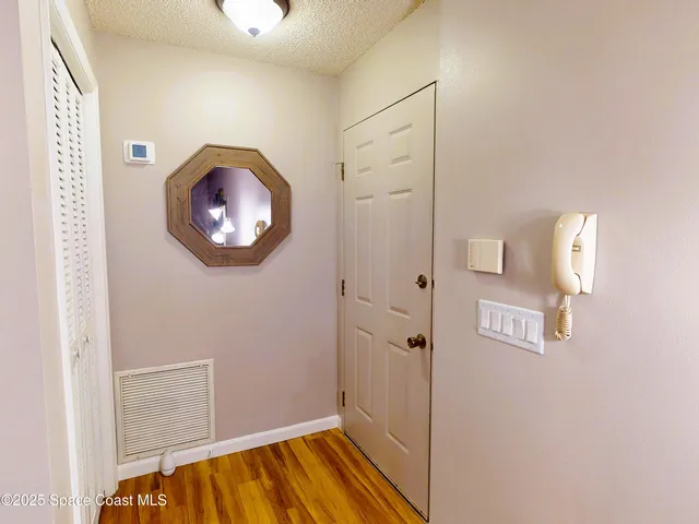 a living room with furniture kitchen view and a dining table