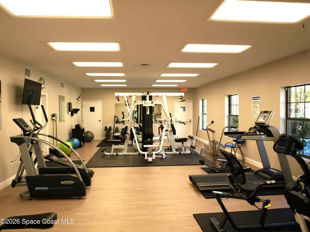a view of an outdoor space and tennis court