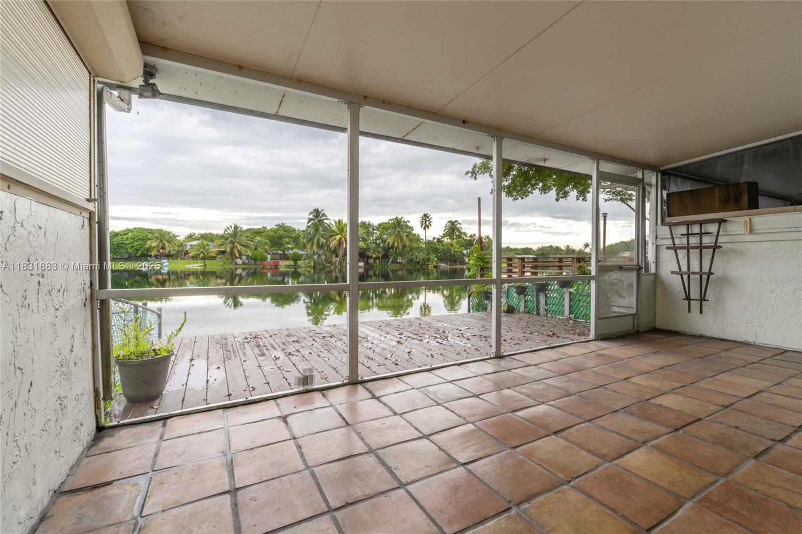 13949 Southwest 84th Street, Unit 801 Miami, FL 33143 - Photo 31 of 38 a view of a room with porch area