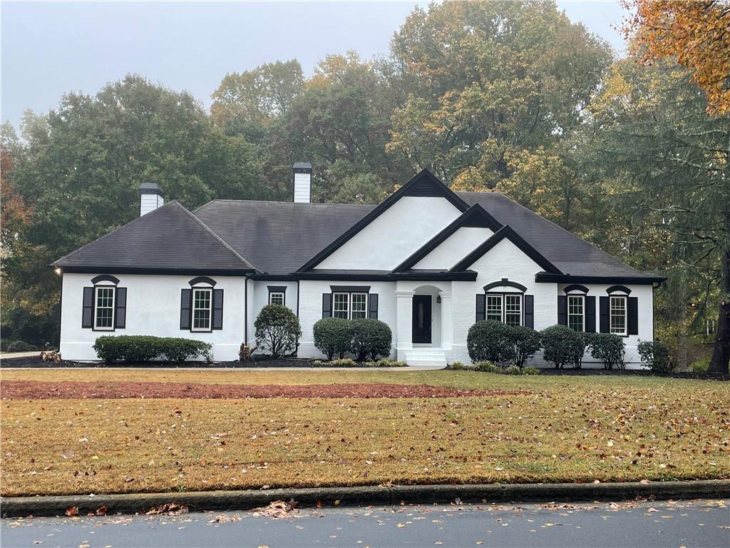 front view of house with a yard