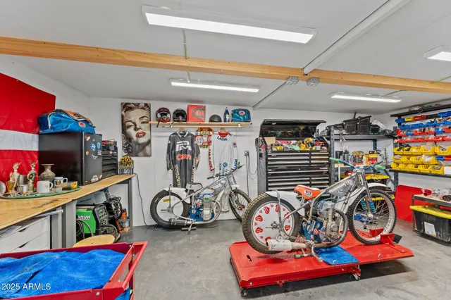 a kitchen with a stove a sink and a microwave