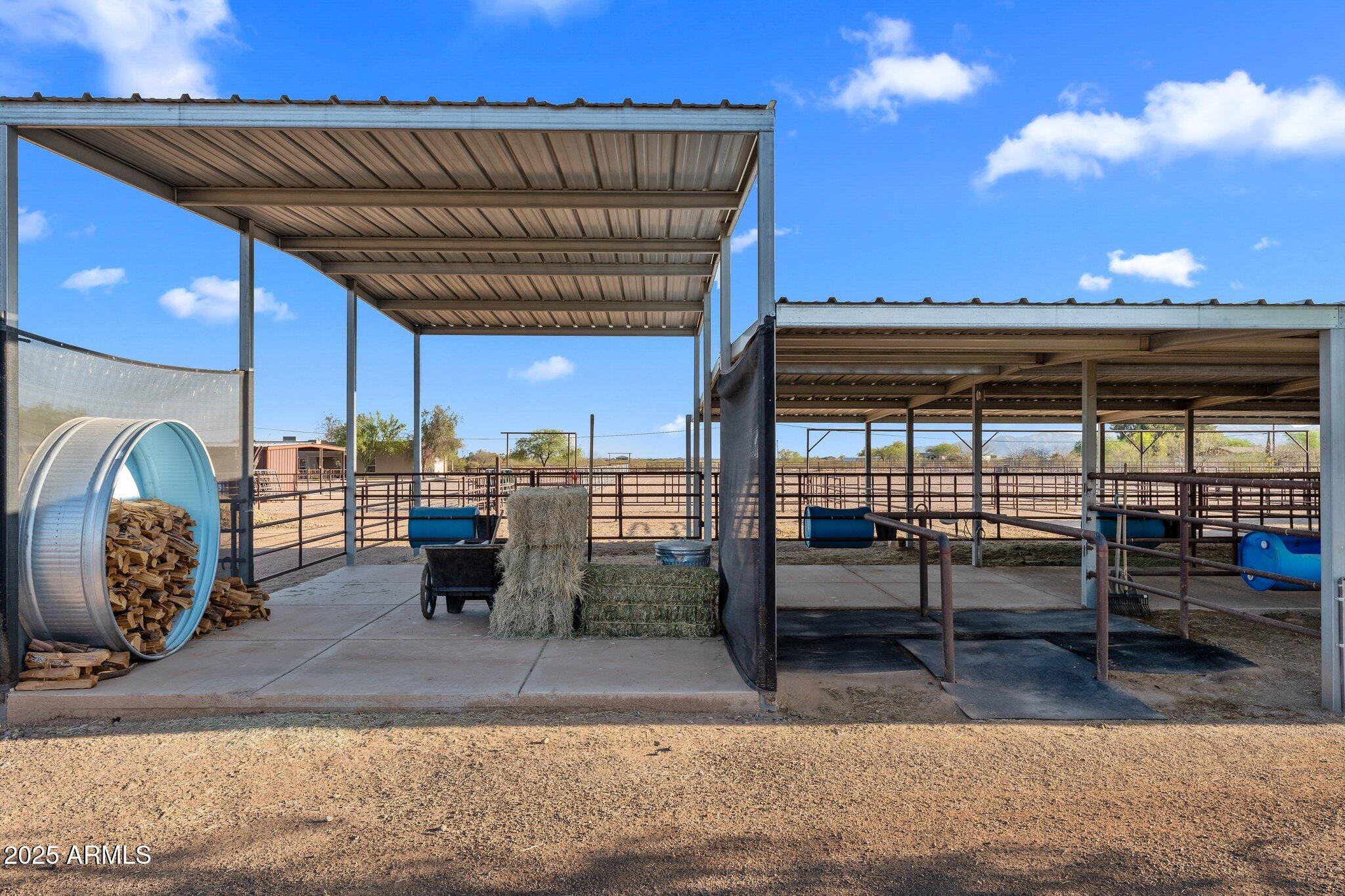 17789 West Peak View Road Surprise, AZ 85387 - Photo 4 of 69 a view of a swimming pool with outdoor seating