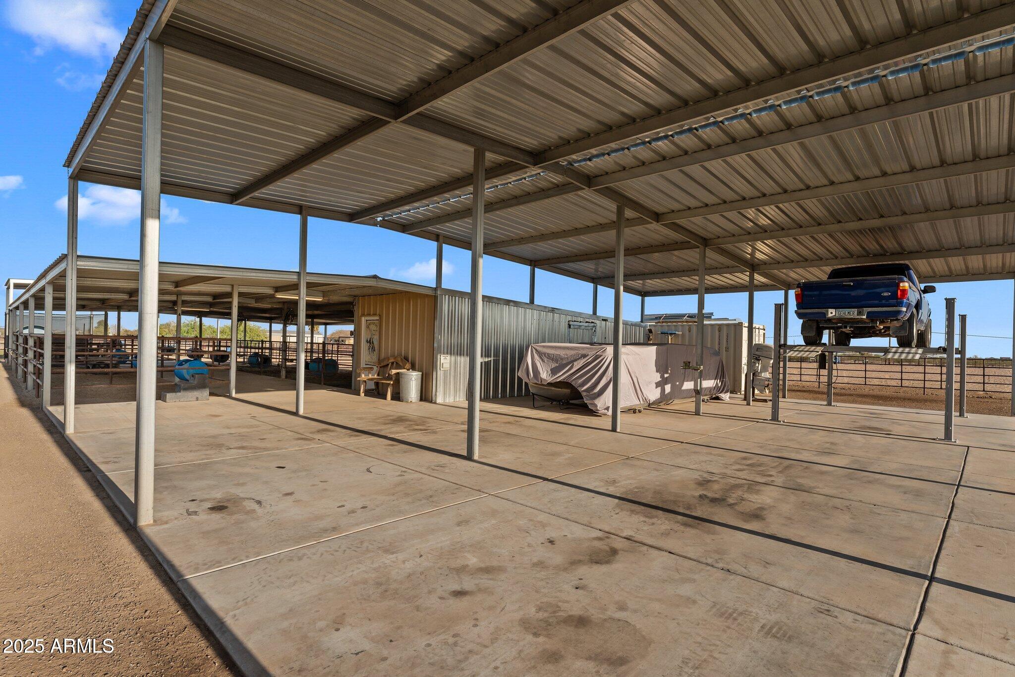 17789 West Peak View Road Surprise, AZ 85387 - Photo 7 of 69 a view of a patio with table and chairs