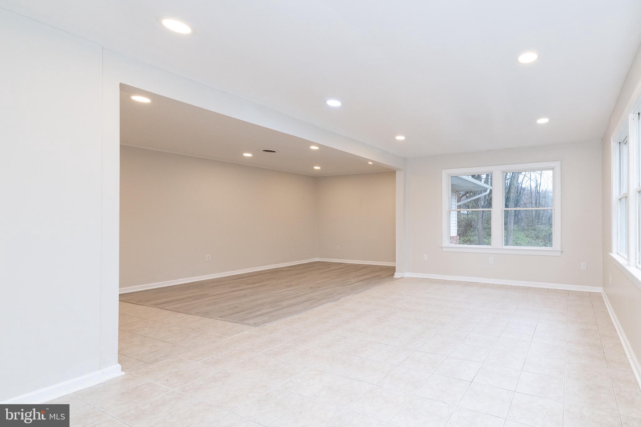 6731 Middle Road Middletown, VA 22645 - Photo 13 of 61 an empty room with windows and entrance