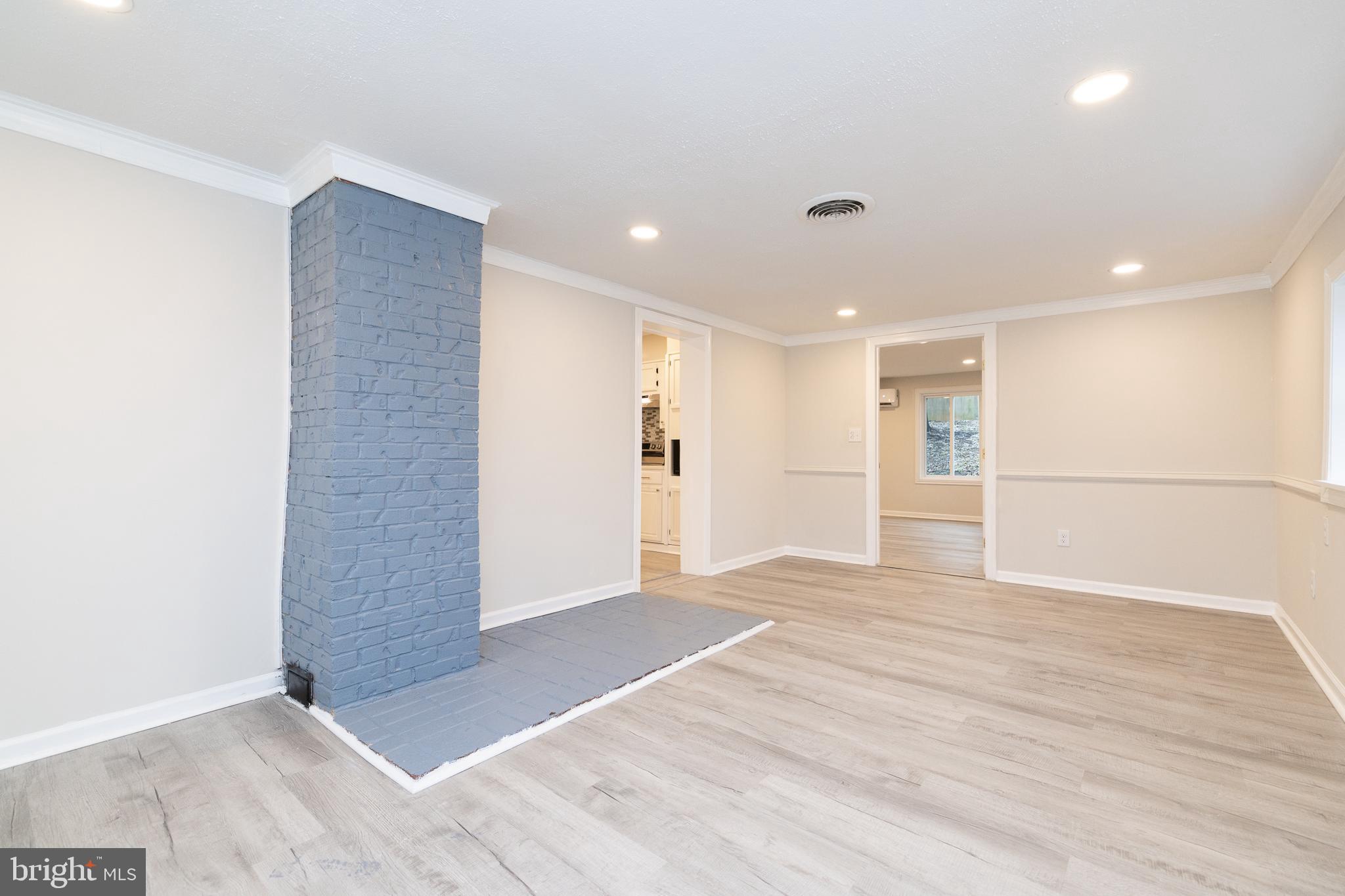 6731 Middle Road Middletown, VA 22645 - Photo 20 of 61 a view of an empty room with wooden floor