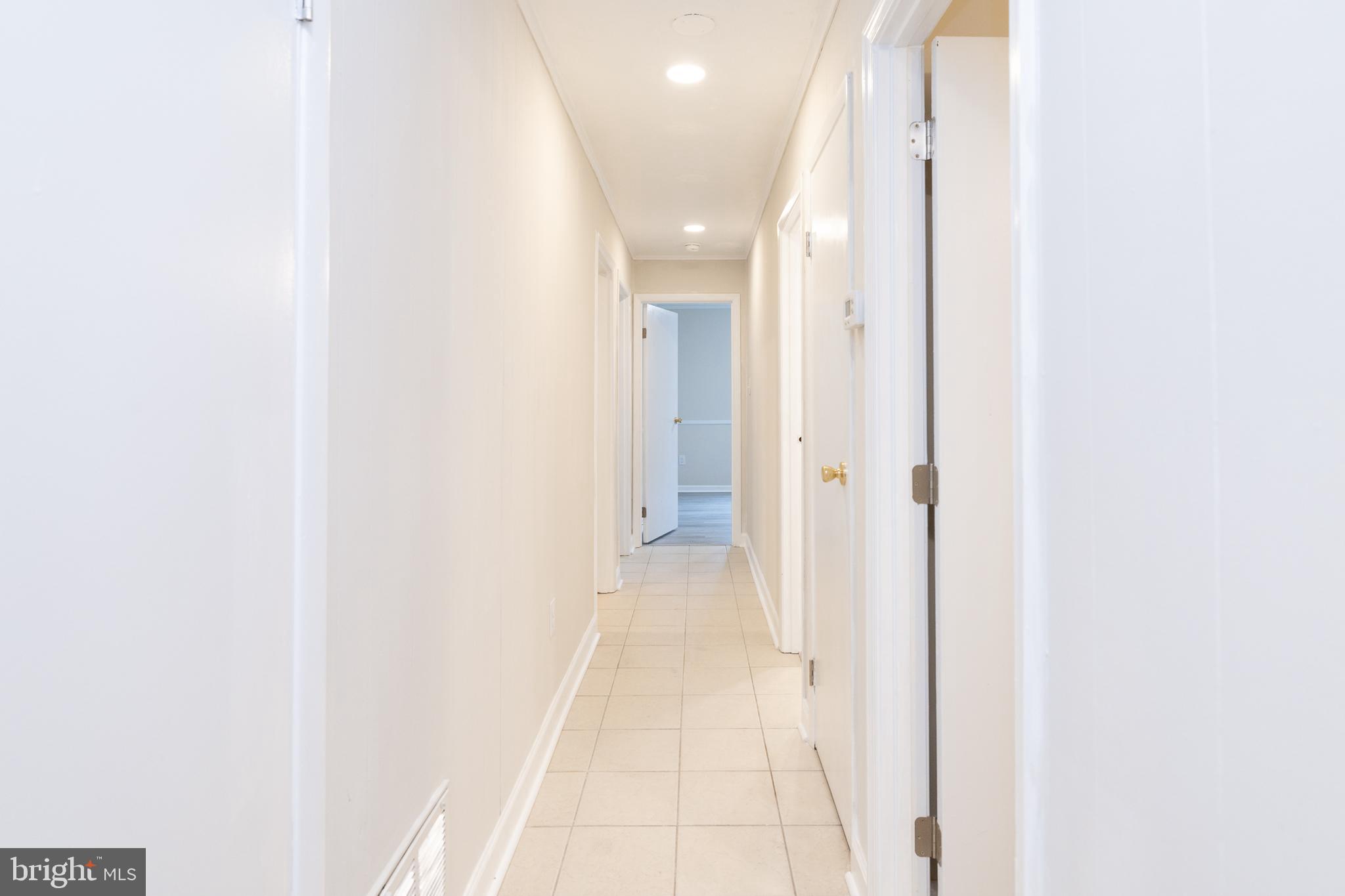 6731 Middle Road Middletown, VA 22645 - Photo 29 of 61 a view of a hallway with wooden floor