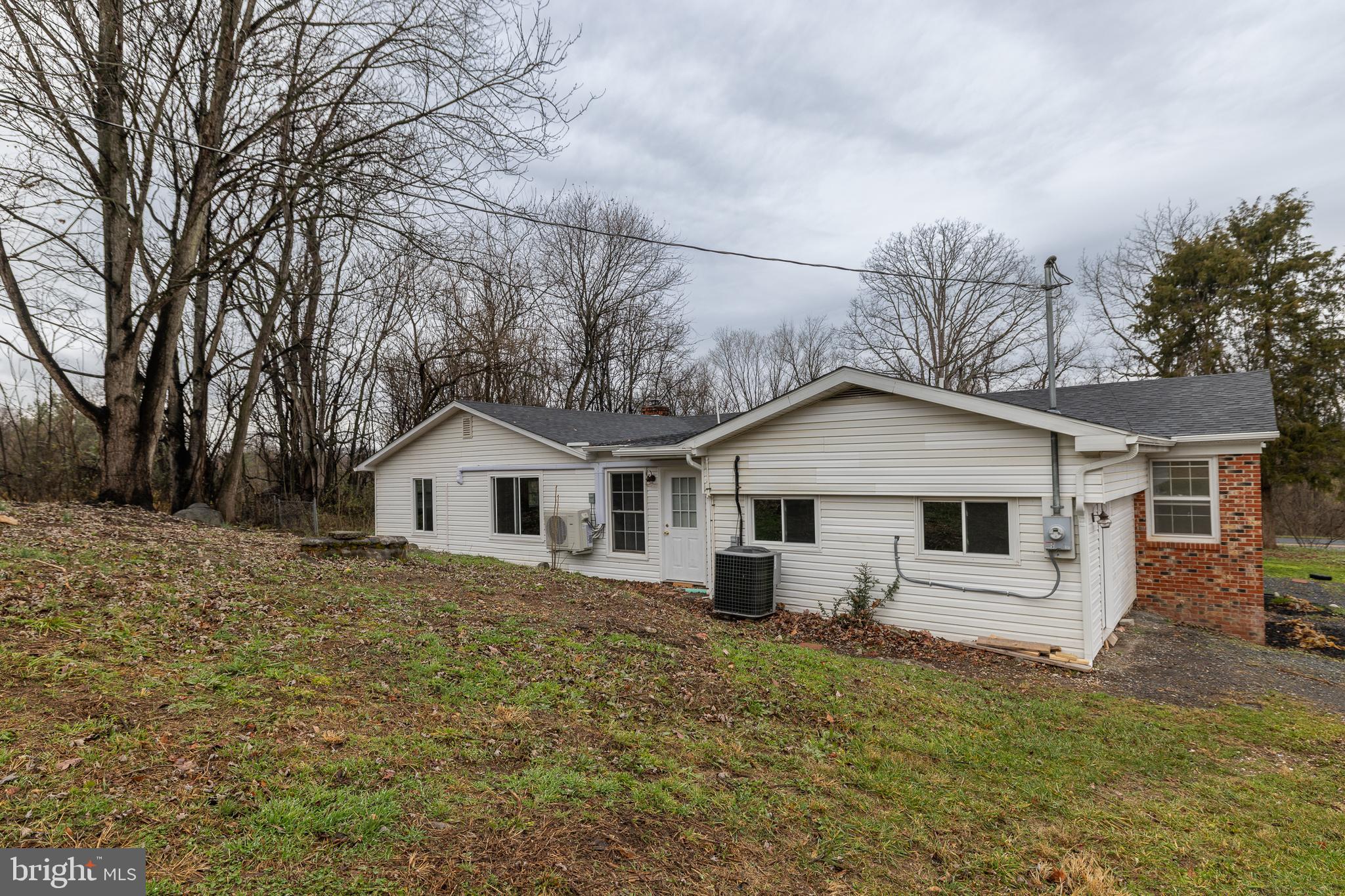 6731 Middle Road Middletown, VA 22645 - Photo 44 of 61 a front view of a house with a yard