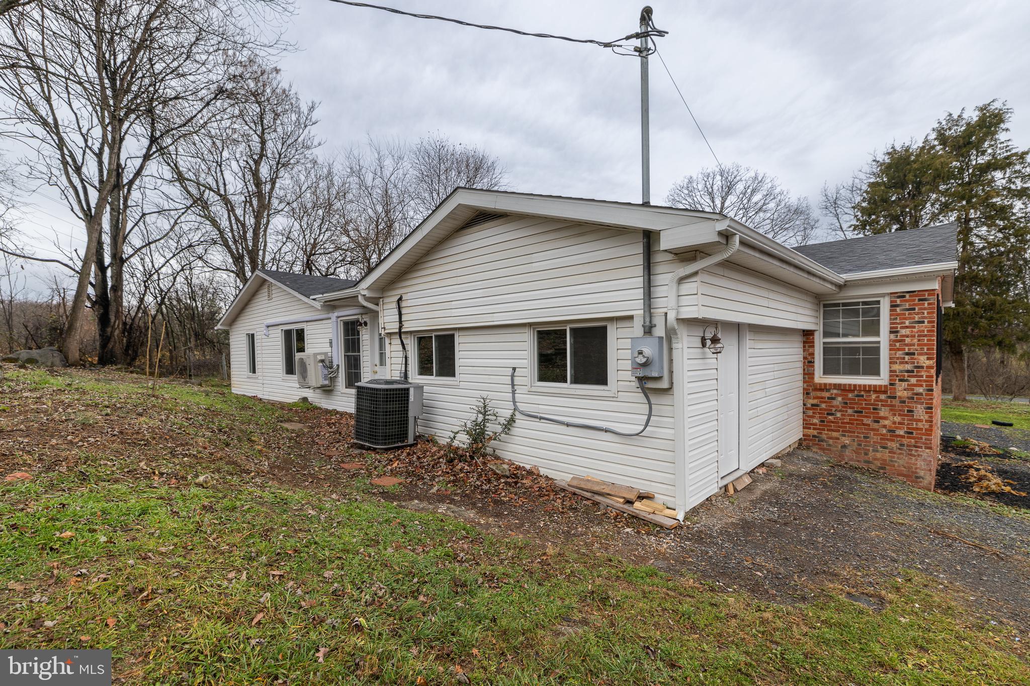6731 Middle Road Middletown, VA 22645 - Photo 45 of 61 a view of a house with a yard