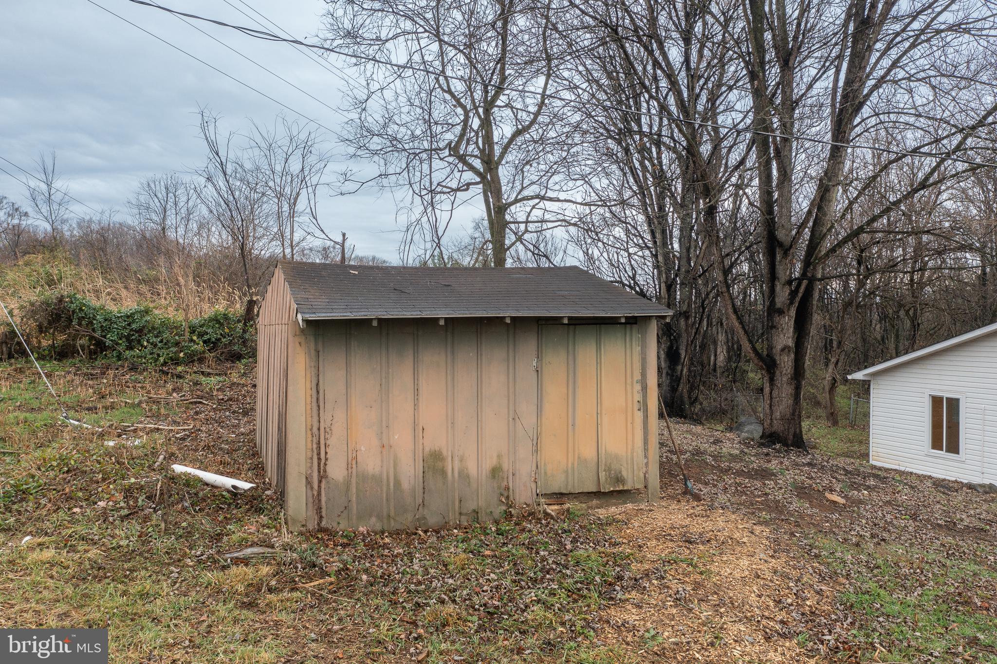 6731 Middle Road Middletown, VA 22645 - Photo 48 of 61 a backyard of a house with lots of green space