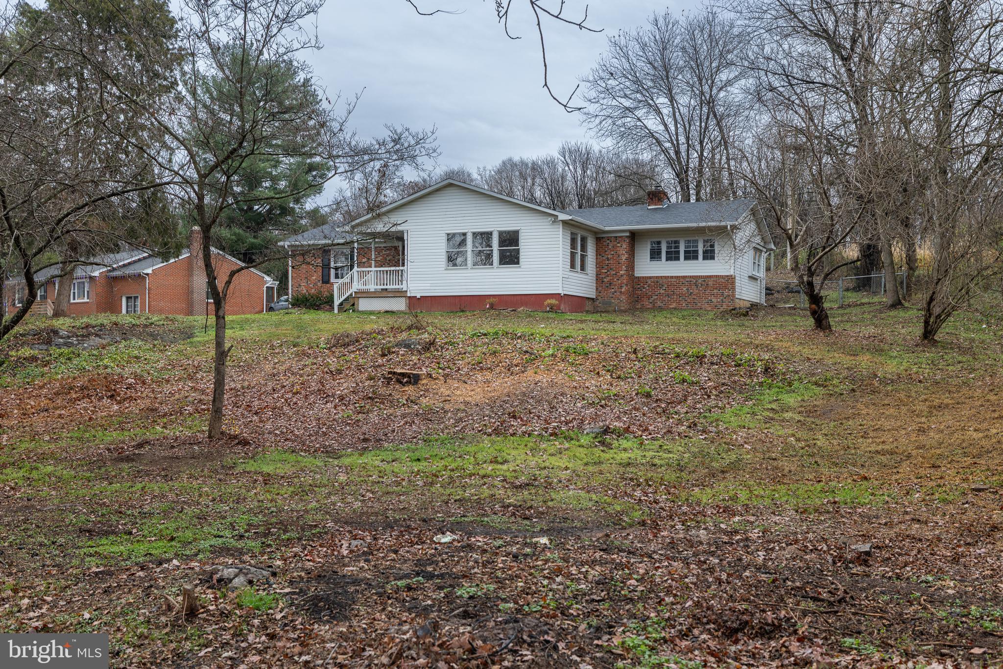 6731 Middle Road Middletown, VA 22645 - Photo 58 of 61 a front view of a house with a yard
