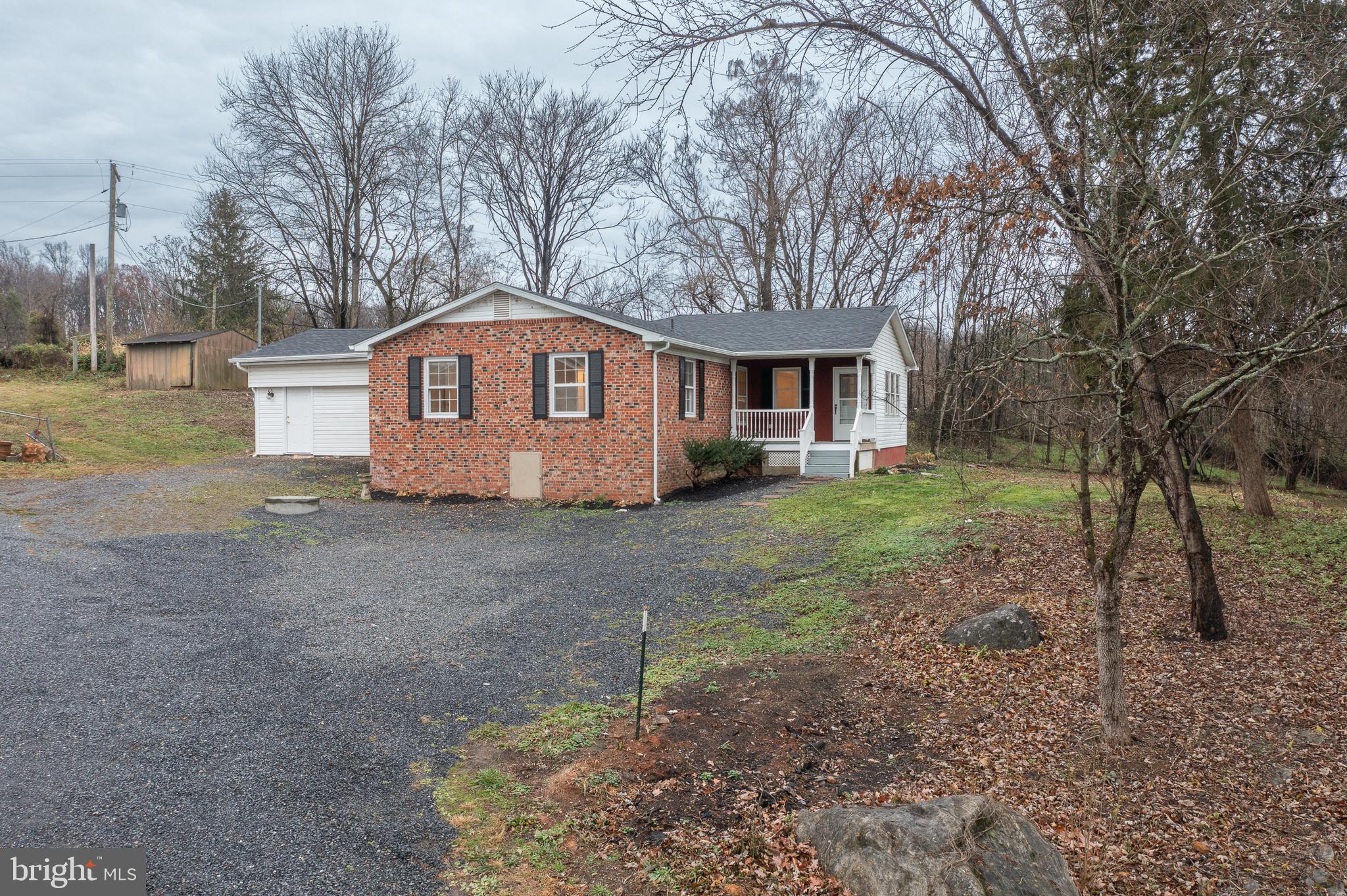 6731 Middle Road Middletown, VA 22645 - Photo 59 of 61 a front view of a house with a yard