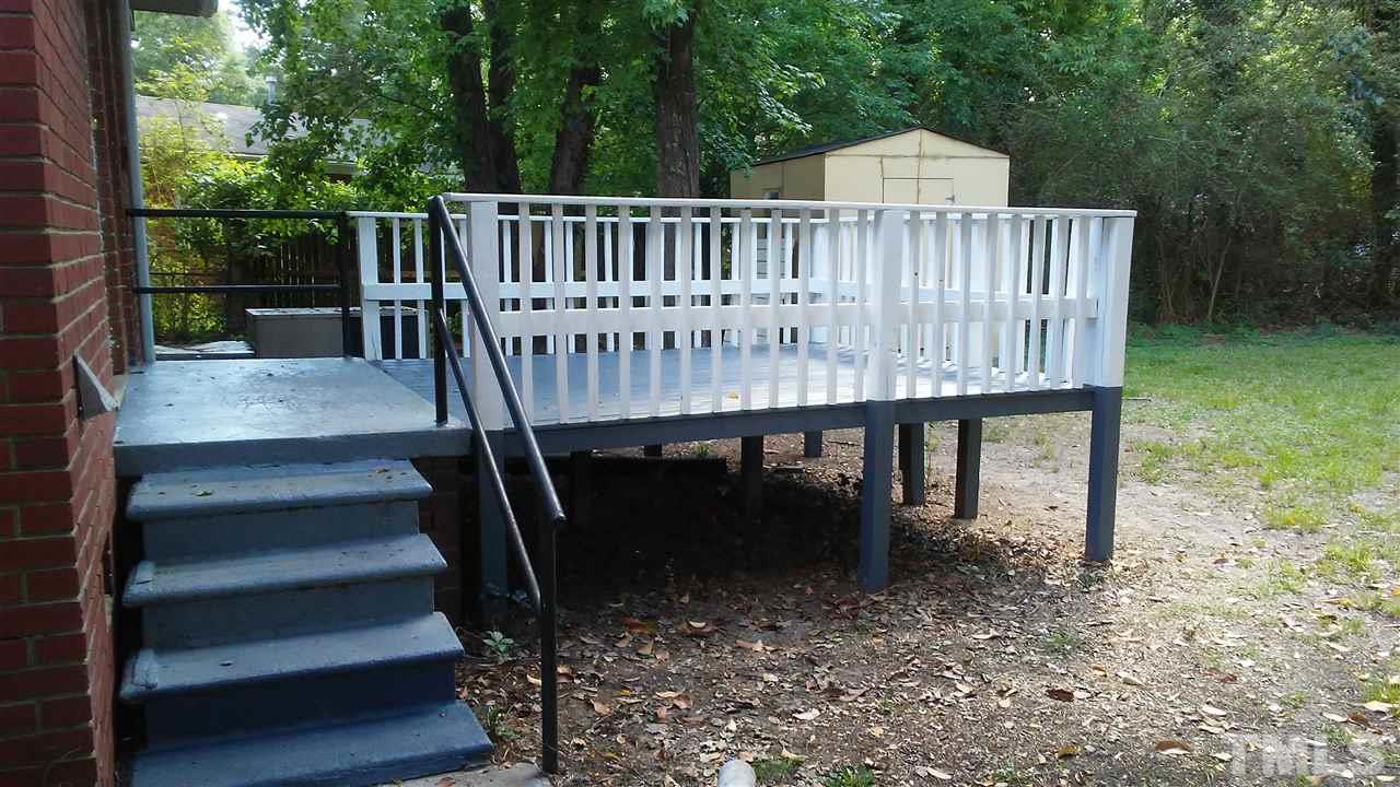 905 Culpepper Lane Raleigh, NC 27610 - Photo 2 of 7 a view of a wooden deck with a bench