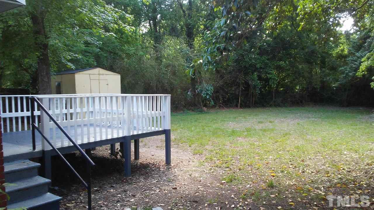 905 Culpepper Lane Raleigh, NC 27610 - Photo 4 of 7 a view of a roof deck with wooden floor and fence