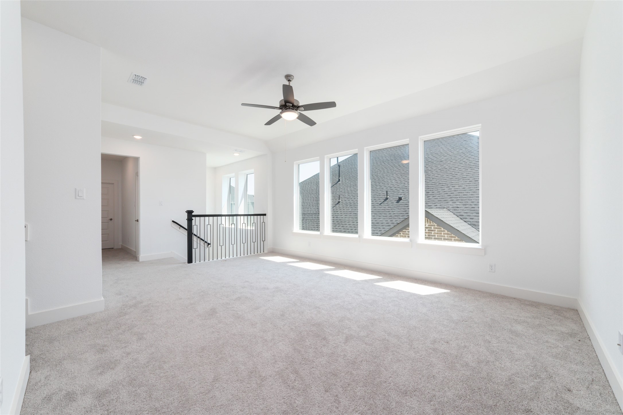 32018 Crested Knl Court Fulshear, TX 77441 - Photo 39 of 49 a view of an empty room with a window