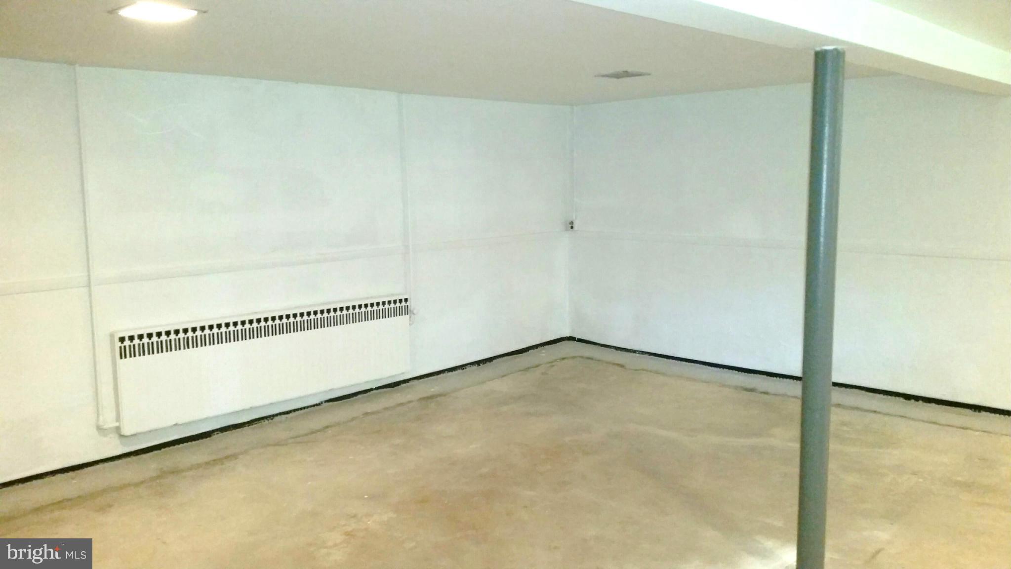 4113 Raleigh Road Baltimore, MD 21207 - Photo 19 of 23 a view of an empty room