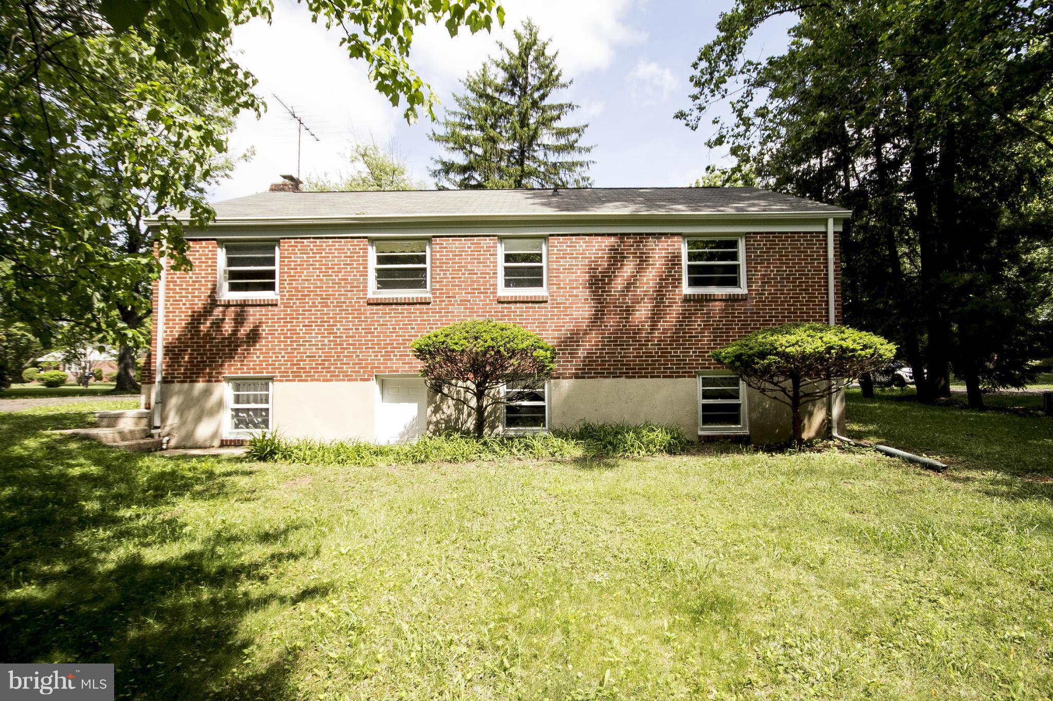 4113 Raleigh Road Baltimore, MD 21207 - Photo 22 of 23 front view of a house with patio