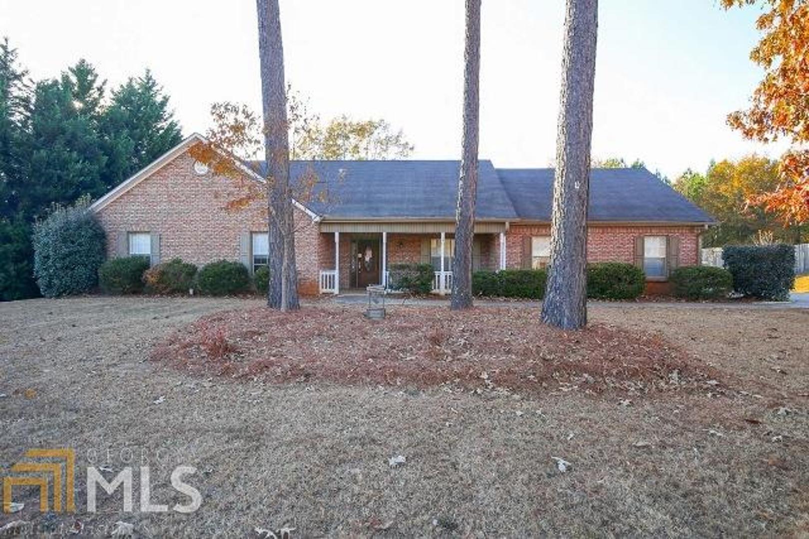 404 Mosby Lane Locust Grove, GA 30248 - Photo 1 of 1 a house view with a outdoor space