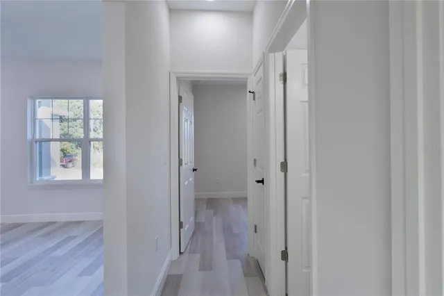 a view of a bathroom from the hallway