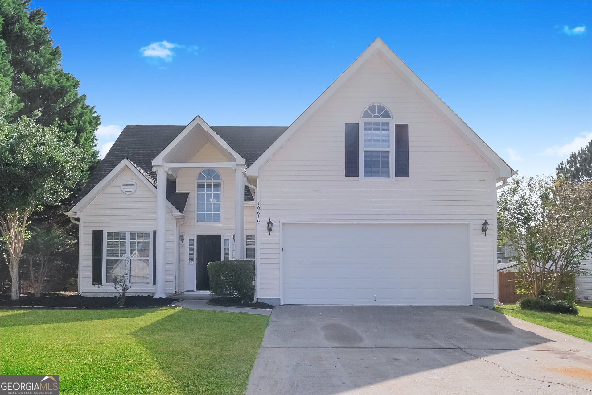 10679 Paladin Drive Hampton, GA 30228 - Photo 1 of 1 a front view of a house with a yard