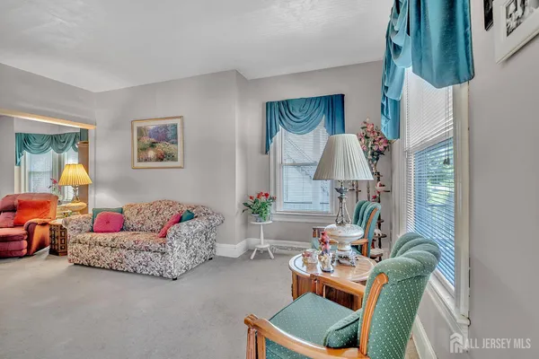 a living room with furniture and a couch