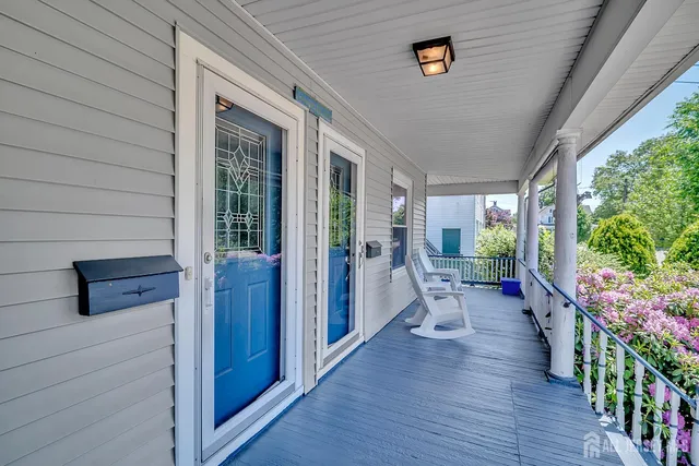 a porch with wooden floor