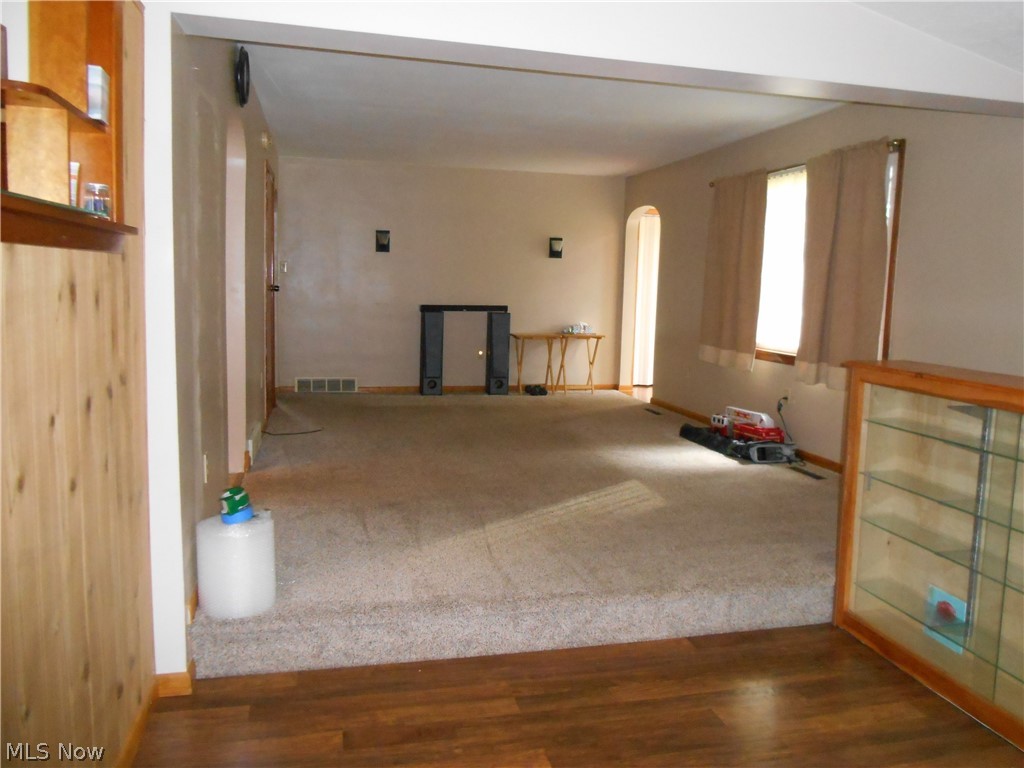 7396 Poore Road Conneaut, OH 44030 - Photo 26 of 35 LIVING ROOM & STEP DOWN BONUS AREA