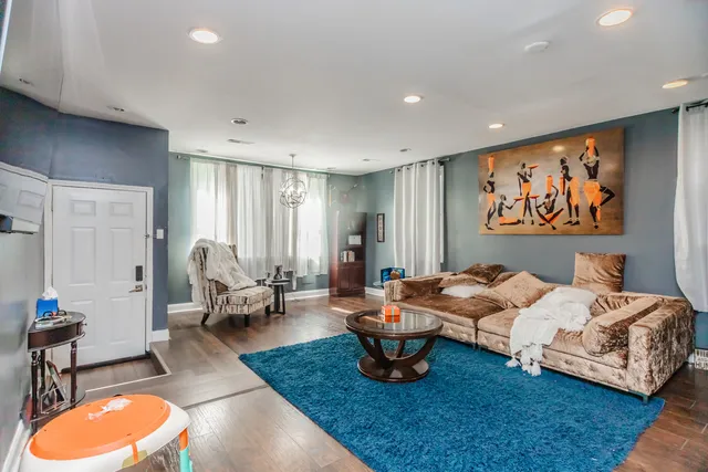 a theatre with furniture and wooden floor