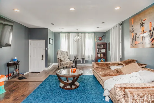 a living room with furniture and window