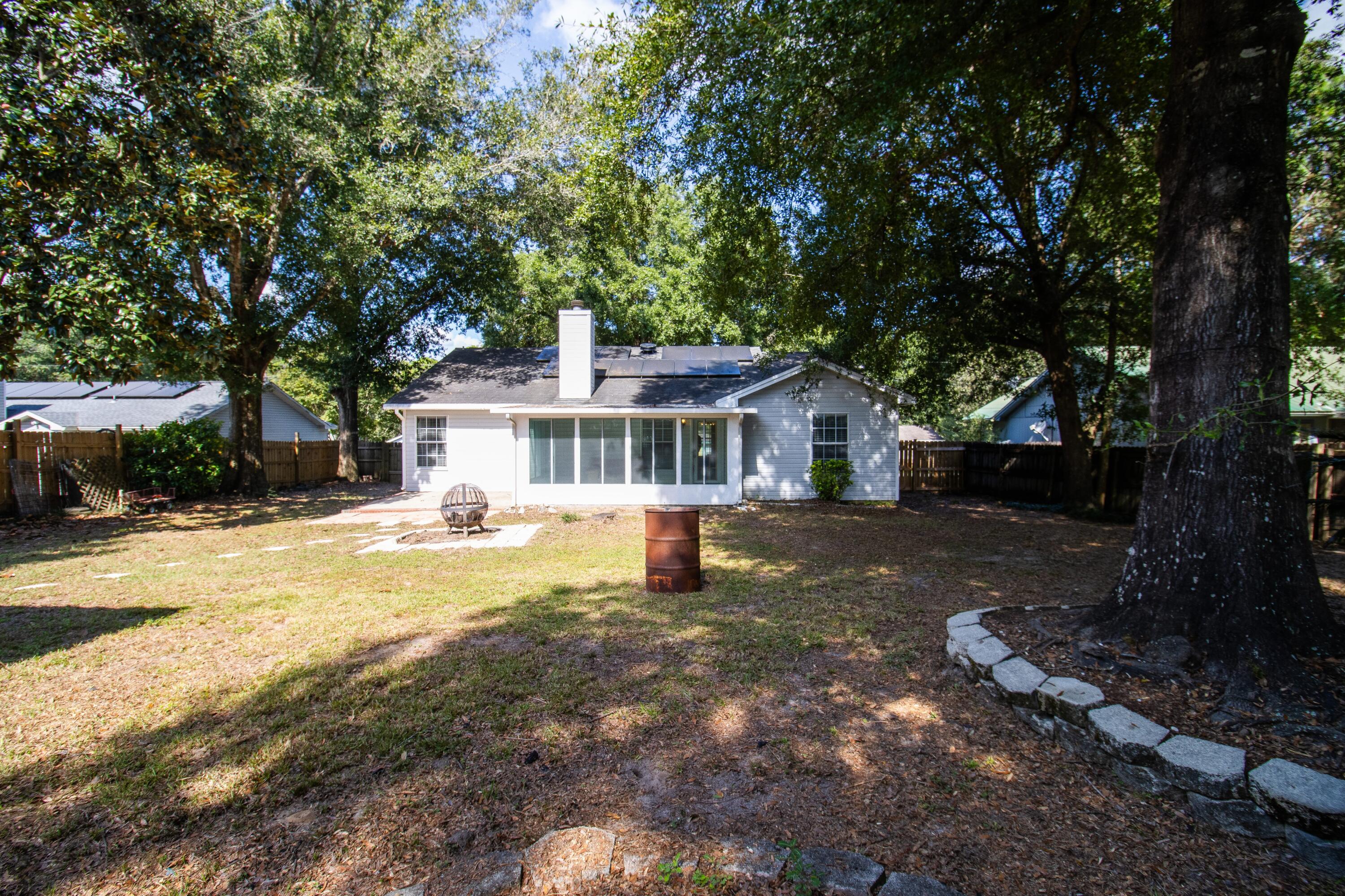 3014 Windsor Circle Crestview, FL 32539 - Photo 19 of 26 a front view of a house with a yard