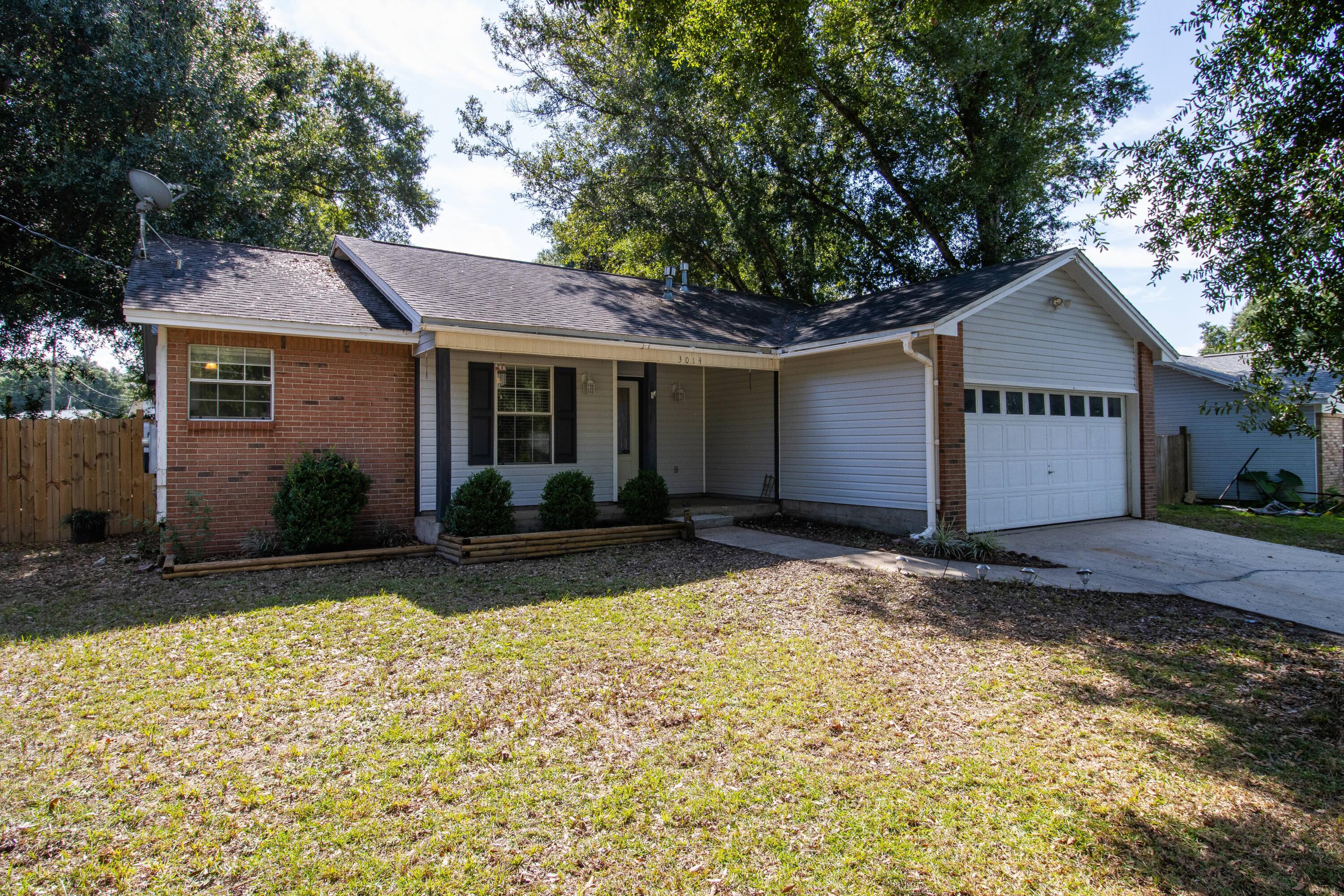 3014 Windsor Circle Crestview, FL 32539 - Photo 25 of 26 a view of a house with a yard