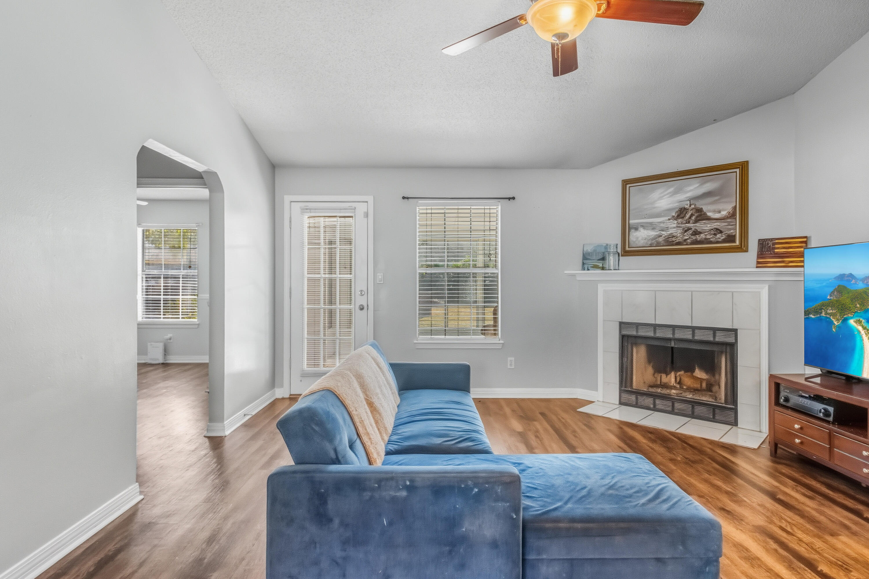 3014 Windsor Circle Crestview, FL 32539 - Photo 7 of 26 a living room with furniture and a fireplace