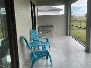 view of living room with furniture and floor to ceiling window