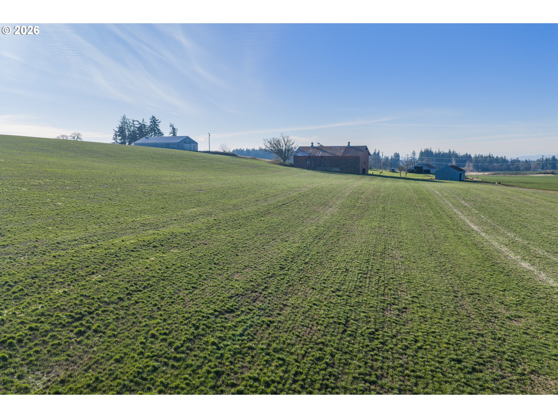 a view of a large body of water with a building in the background