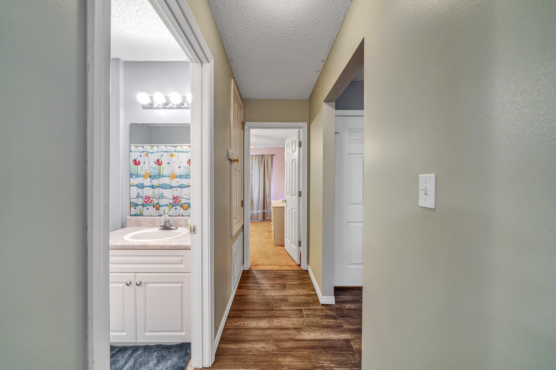 1787 Old Ranch Road Fort Walton Beach, FL 32547 - Photo 18 of 25 a view of a hallway with wooden floor and closet
