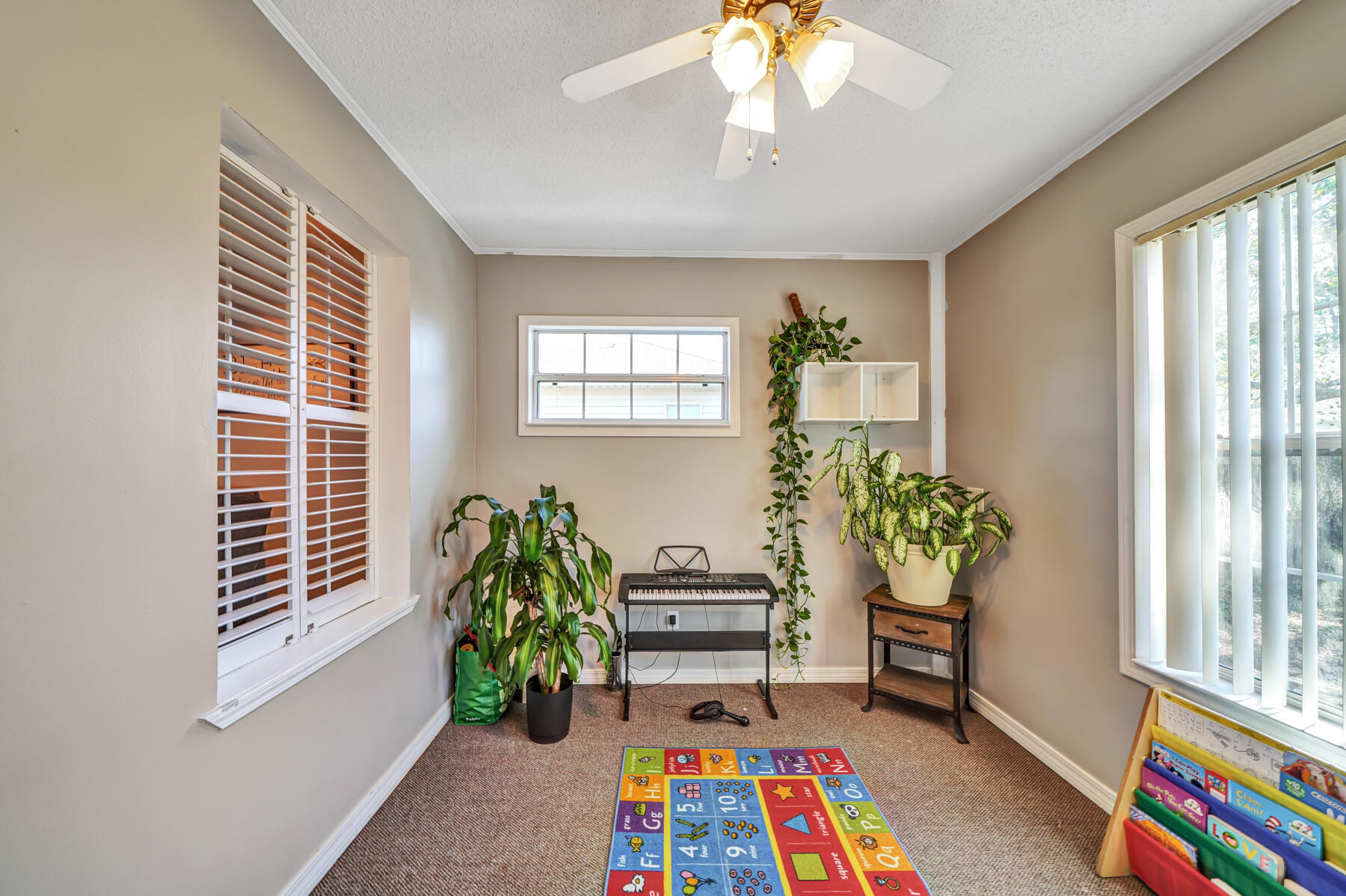 1787 Old Ranch Road Fort Walton Beach, FL 32547 - Photo 10 of 25 a bedroom with furniture and a potted plant