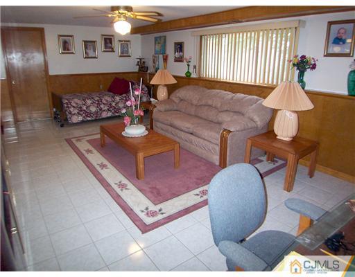 2 Rugby Road Colonia, NJ 07067 - Photo 11 of 15 a living room with furniture