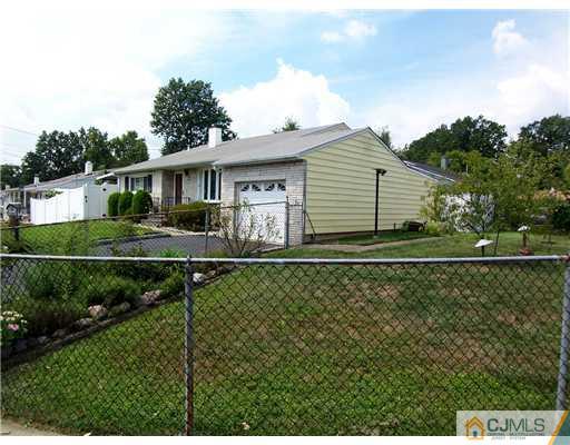 2 Rugby Road Colonia, NJ 07067 - Photo 15 of 15 a view of a house with a yard