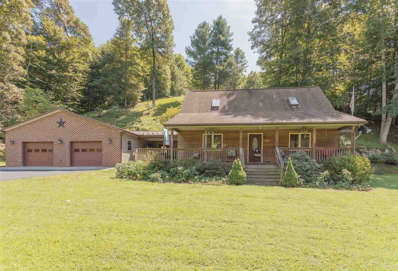 604 North Fork Road Amherst, VA 24521 - Photo 1 of 50 a front view of house with yard and trees around