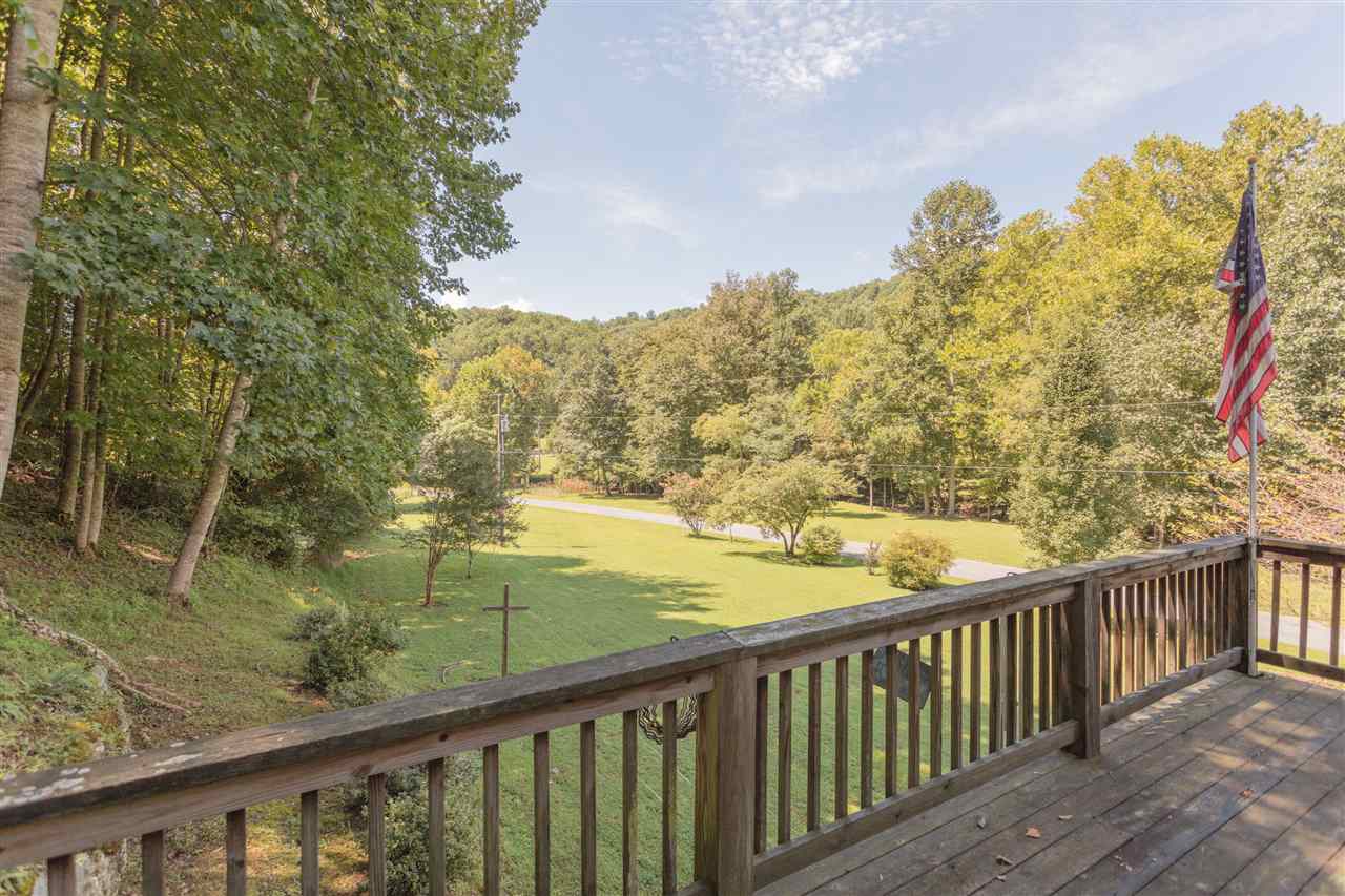 604 North Fork Road Amherst, VA 24521 - Photo 32 of 50 a view of a balcony with wooden fence