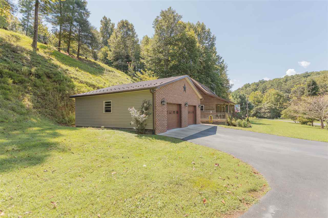 604 North Fork Road Amherst, VA 24521 - Photo 45 of 50 a view of a house with a yard and garage