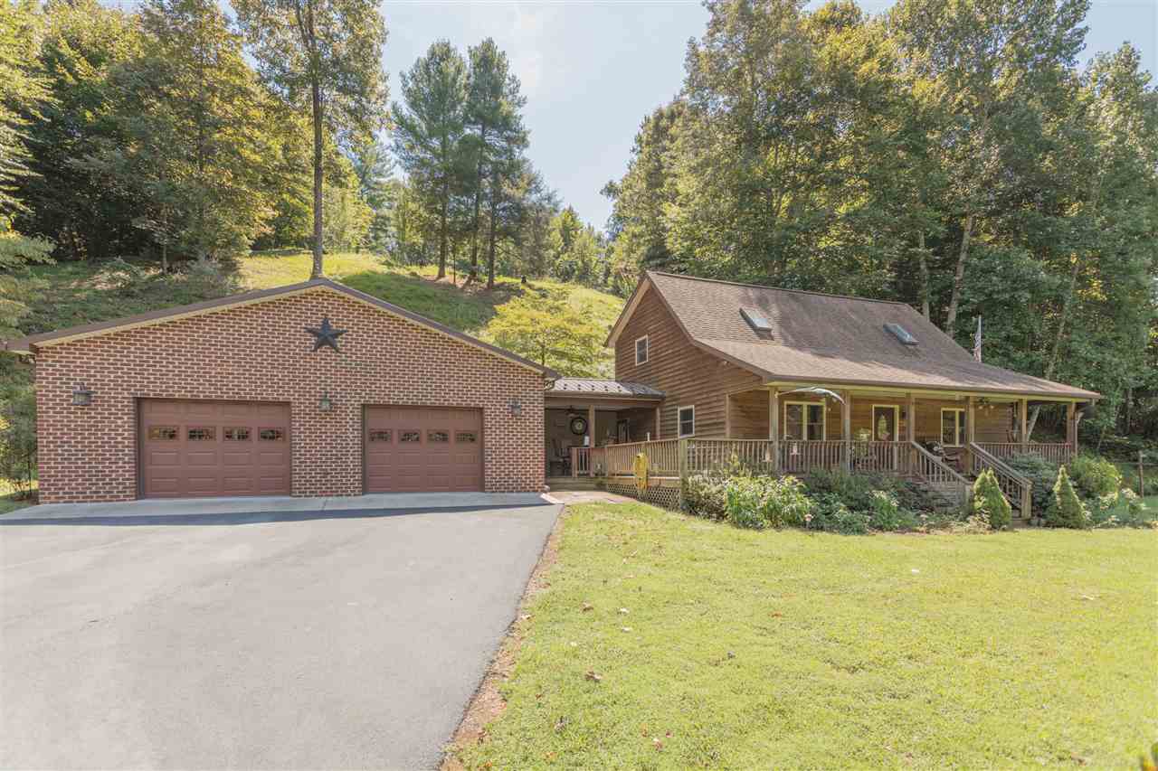604 North Fork Road Amherst, VA 24521 - Photo 46 of 50 a front view of house with yard and trees around