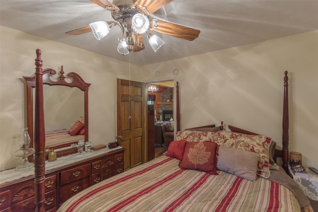604 North Fork Road Amherst, VA 24521 - Photo 5 of 50 a bedroom with a bed and a dresser