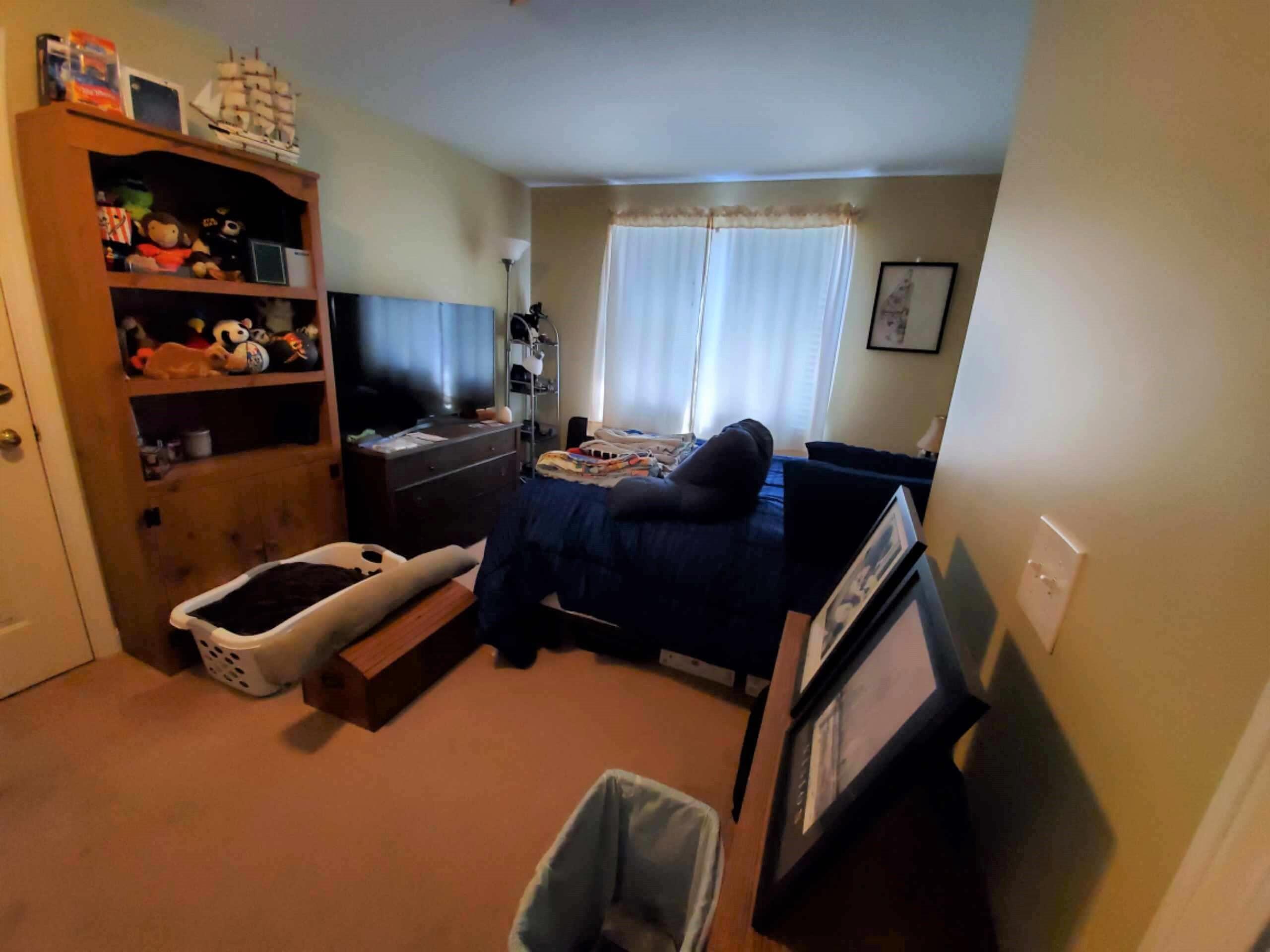 250-252 Underpass Road Brewster, MA 02631 - Photo 13 of 30 a living room with furniture and a flat screen tv